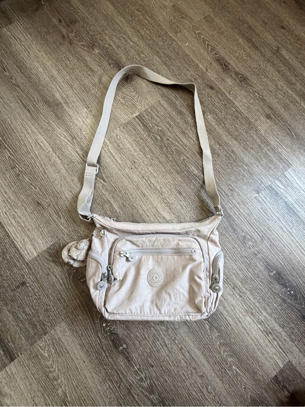 Kipling Light Beige Crossbody Bag with Multiple Zips